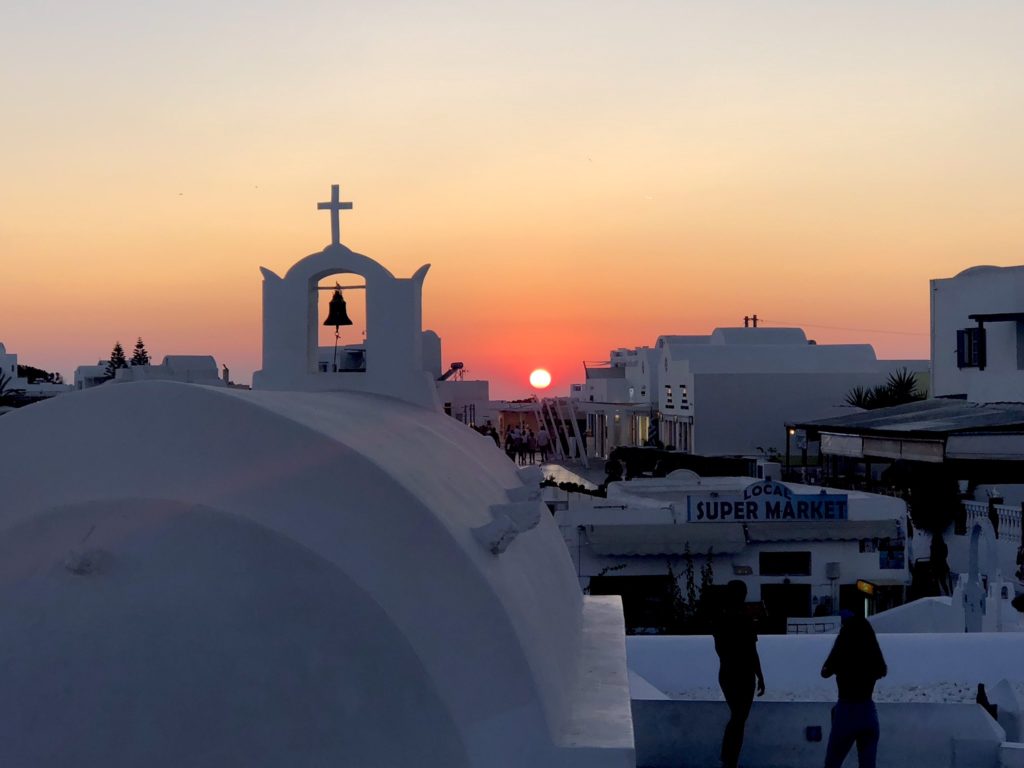 Watching the sun set in Santorini is a MUST!