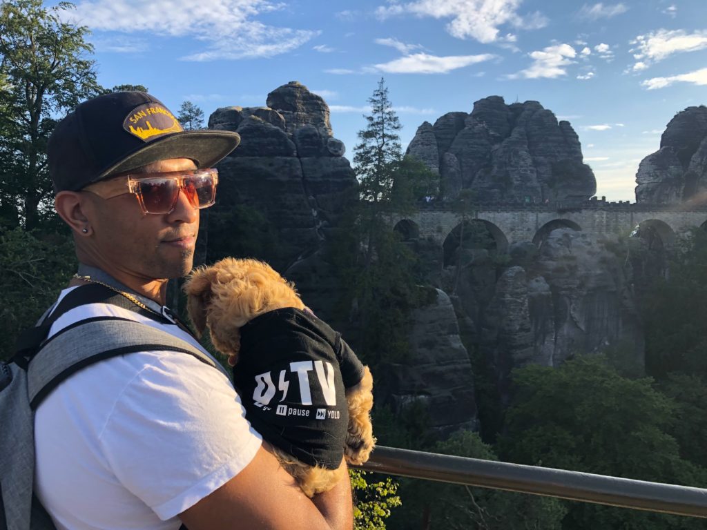 overlook of bastei bridge with dog