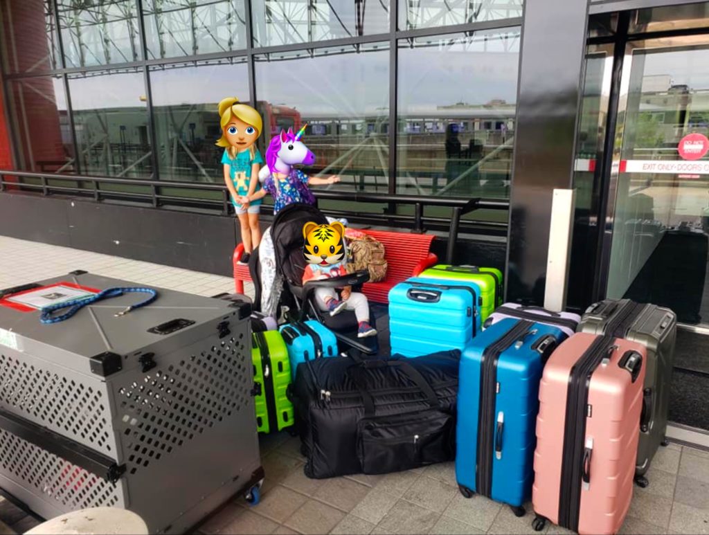 luggage, pet, and kids at BWI airport for patriot express flight